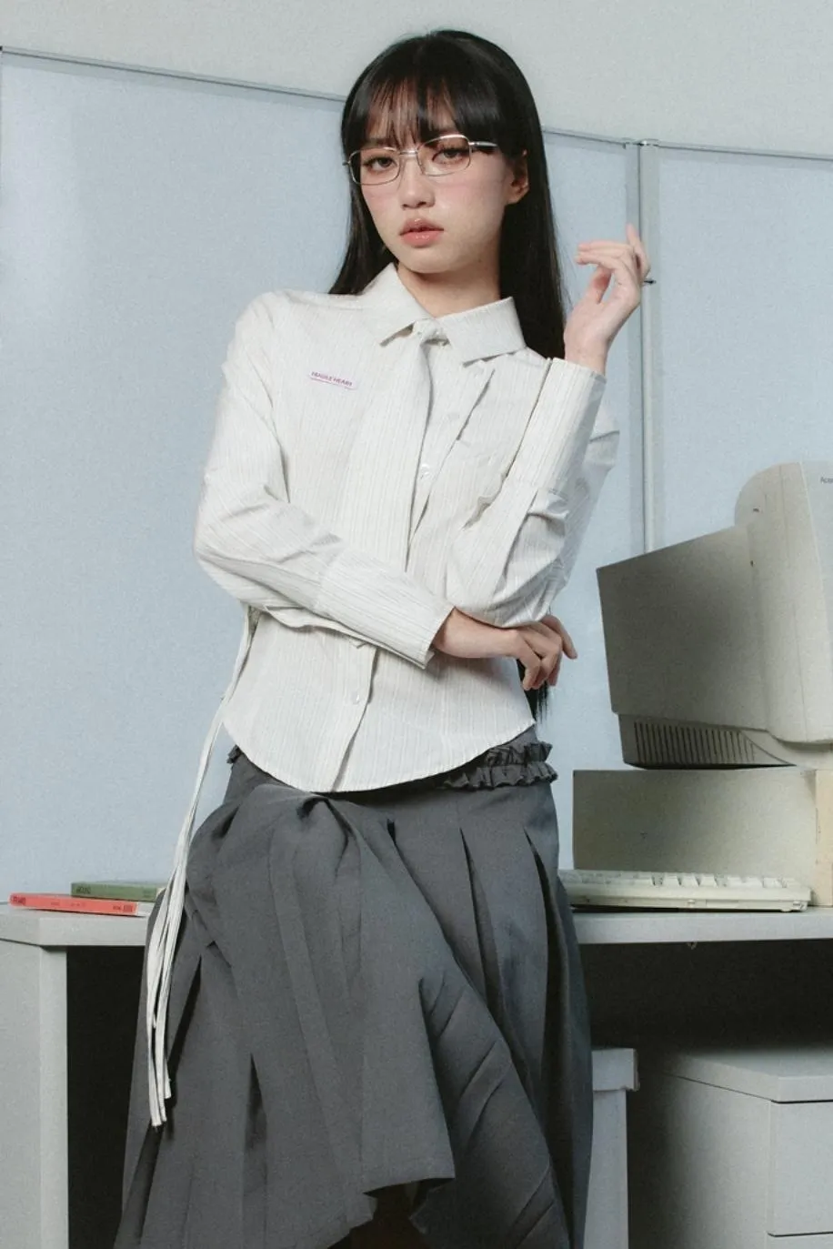 Avant-Garde Asymmetric White Button-Up Shirt with Side Tie Detail